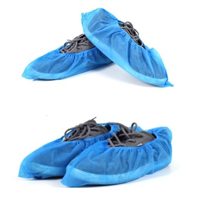 L'anti protettore blu di plastica della scarpa di slittamento riguarda non lo slittamento